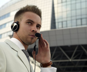 security guard having a call using his headphone