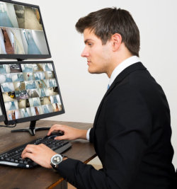 man looking at a screen